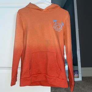 2 colored orange sweatshirt